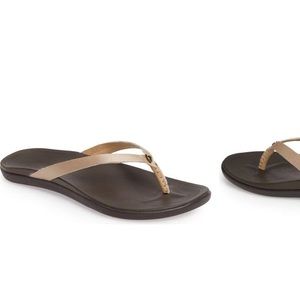 Olukai bronze leather flip flops and comfort sole